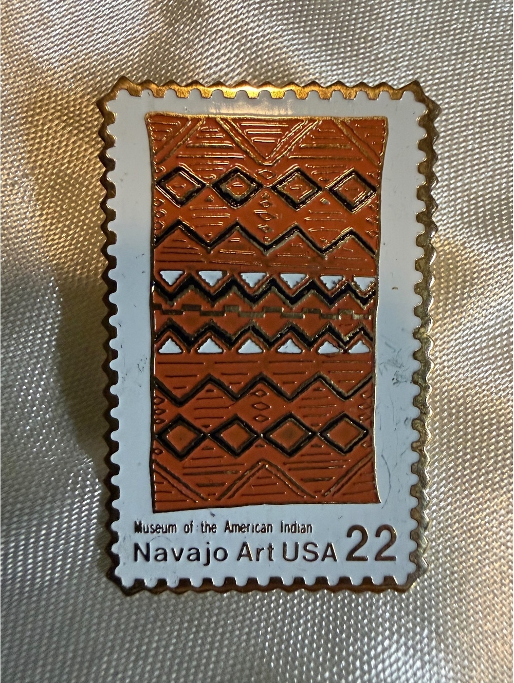 Stamp pin